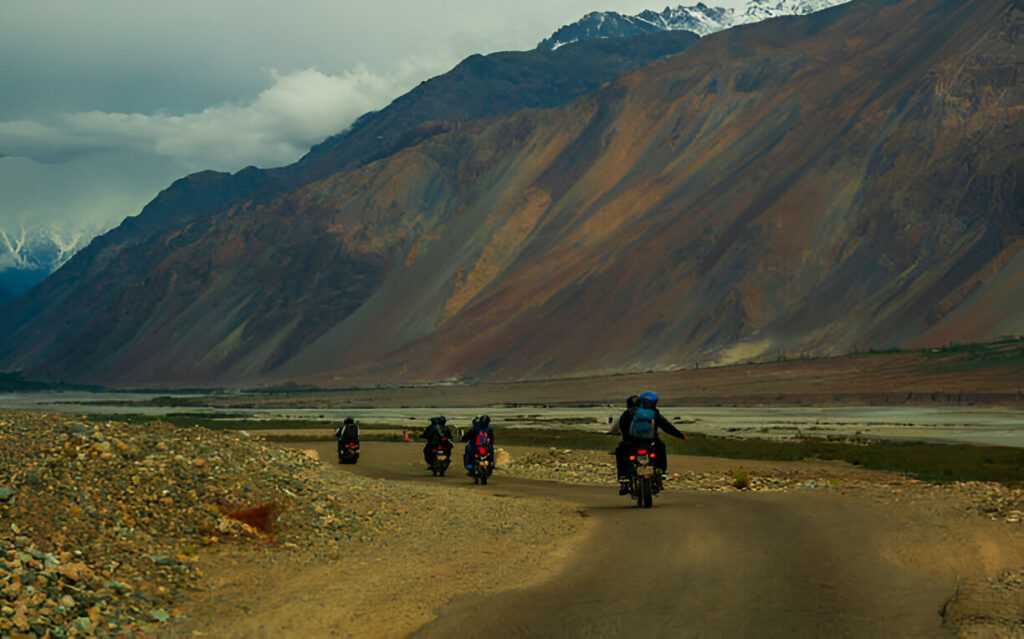 Bikers enjoying beautiful scenic view of ladakh
